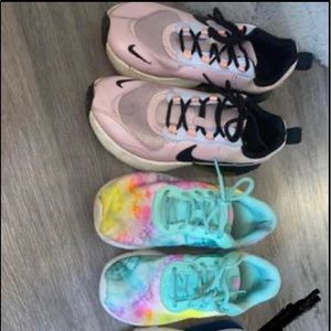 2 different pairs of Nikes